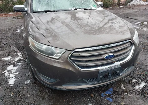 2015 Ford Taurus Limited z USA, uszkodzony, nr VIN 1FAHP2F89FG165526